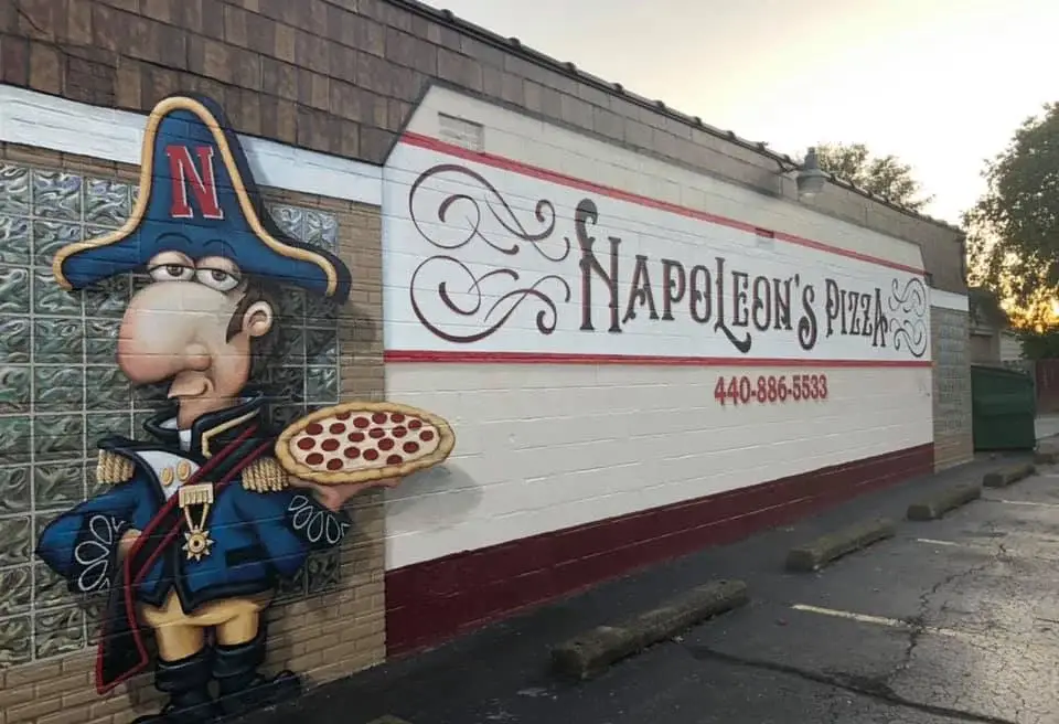 The Napoleon's Pizza mural on the side of the restaurant